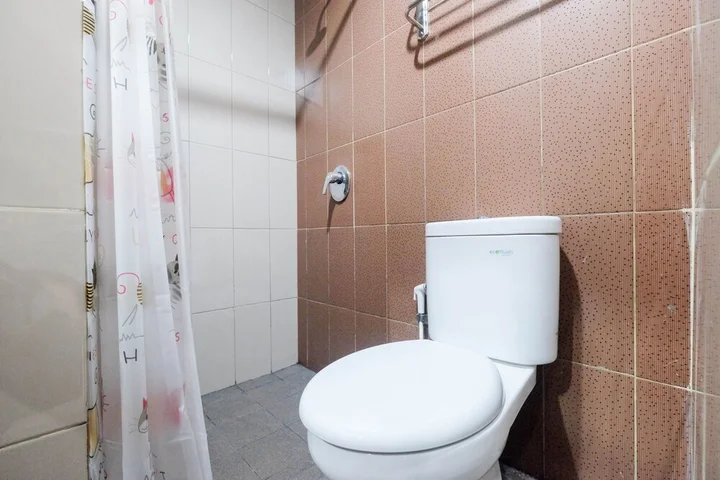 Депок: Warm and Homey 1BR Apartment at Atlanta Residences By Travelio