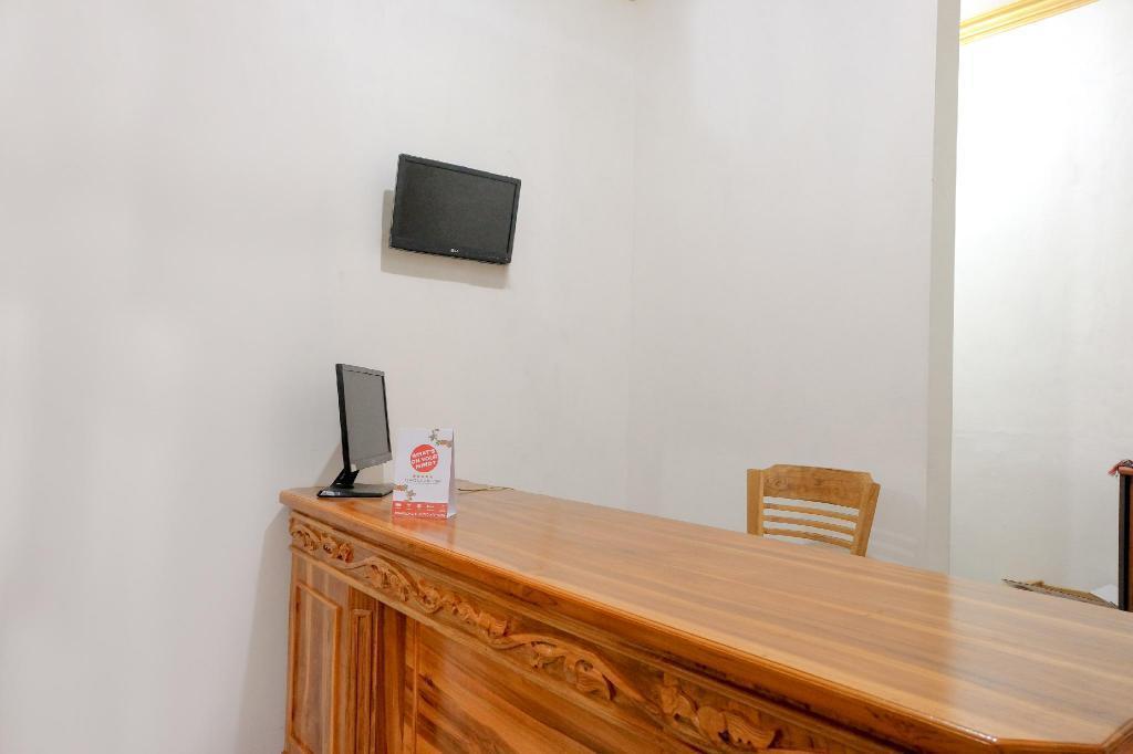 Маланг: OYO 2986 D and a Guesthouse Syariah And Rent Car