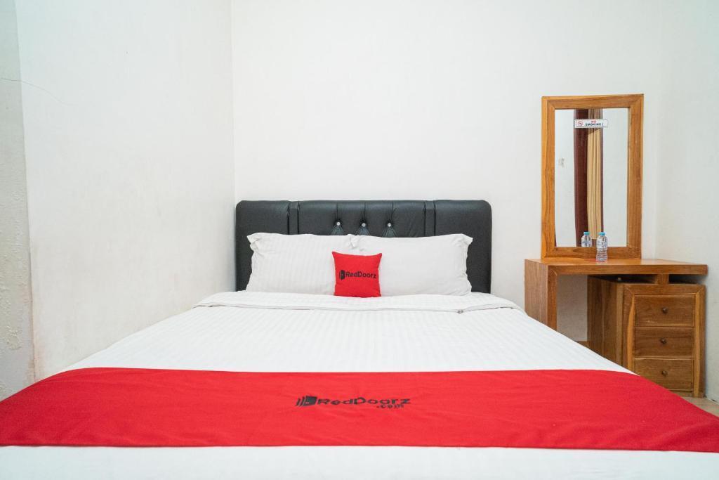 Маланг: OYO 2986 D and a Guesthouse Syariah And Rent Car