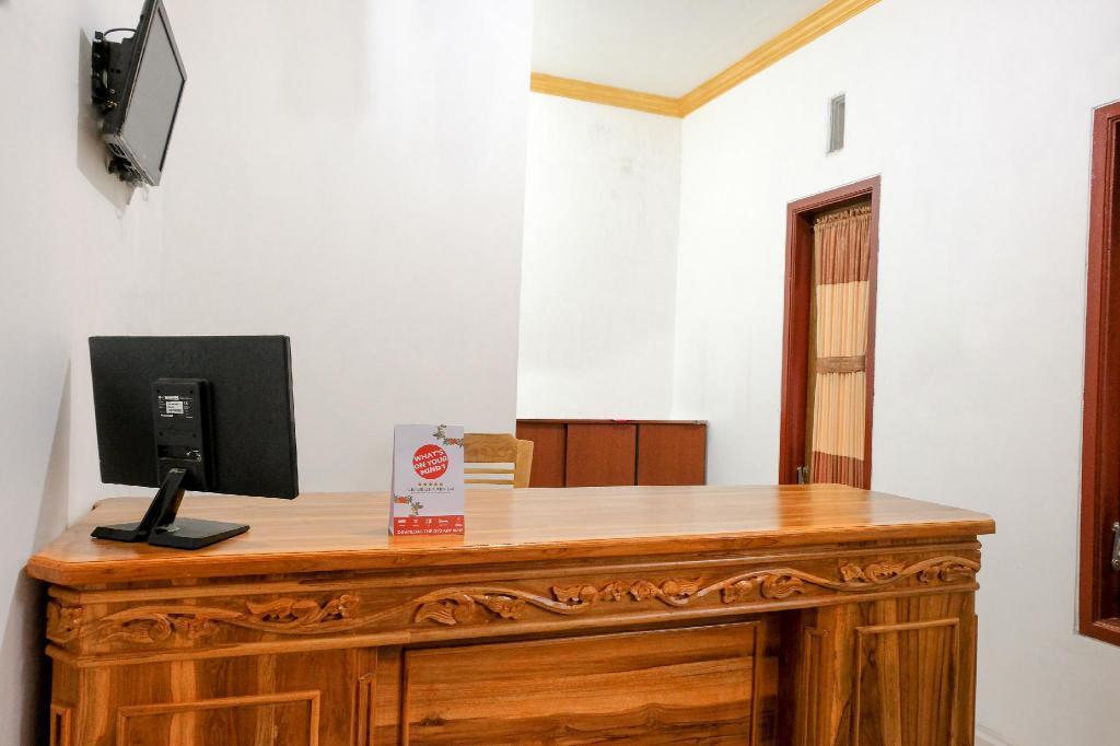 Маланг: OYO 2986 D and a Guesthouse Syariah And Rent Car