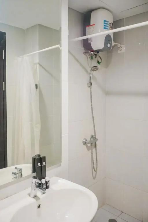 Legok: Minimalist and Comfortable 1BR Casa De Parco Apartment