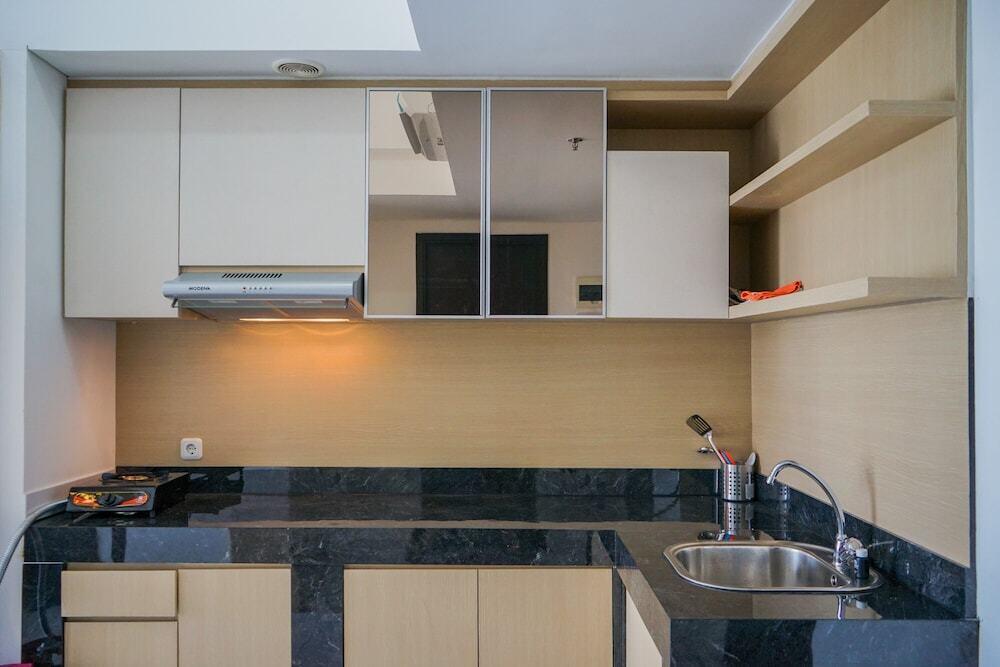 Legok: Modern and Tranquil 1BR @ Casa De Parco Apartment