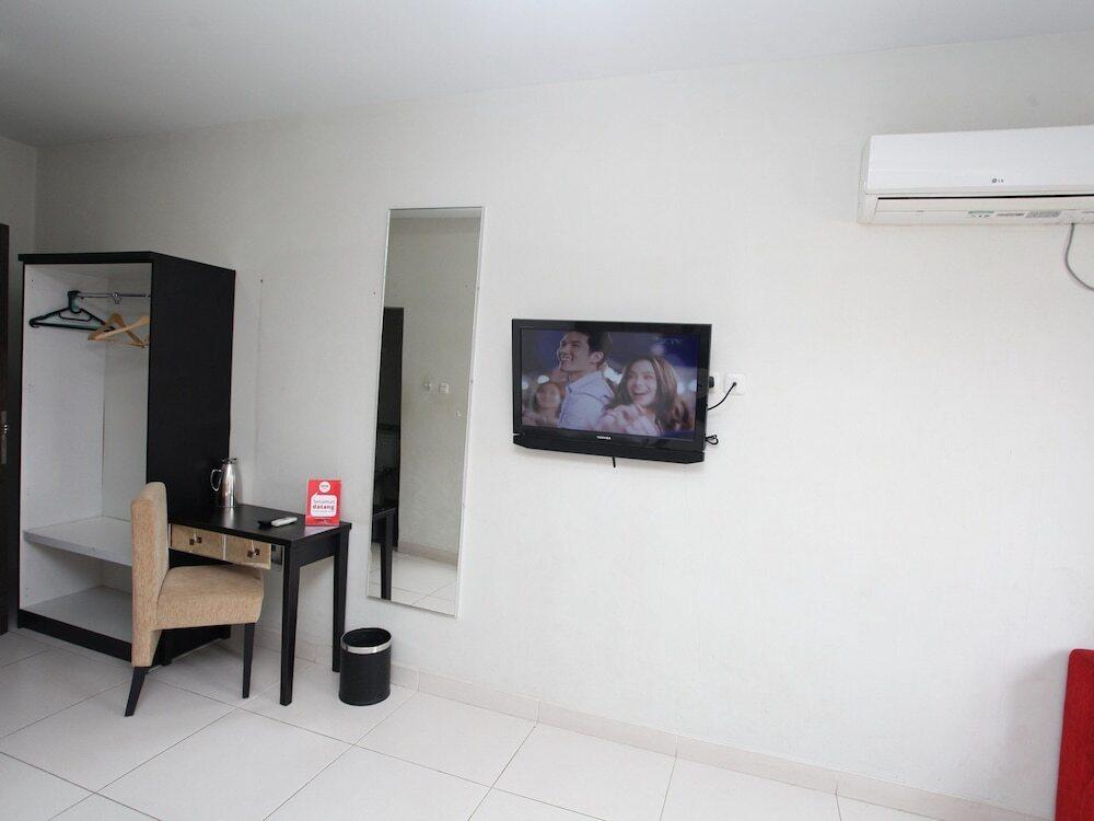 Nida Rooms Lubis 3 Medan Baru at Hotel Rumah Anaya — фото 5