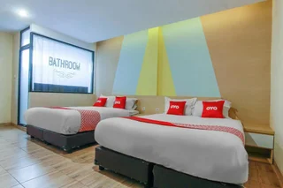 Медан: Capital O 3476 Millenium Inn