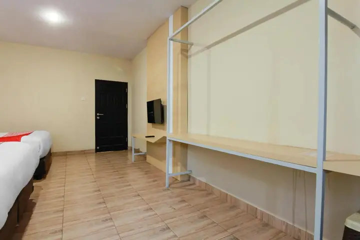 Медан: Capital O 3476 Millenium Inn