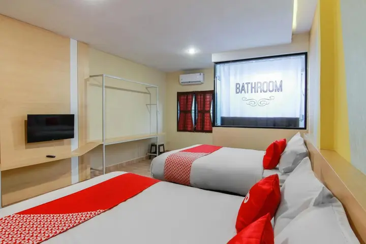 Медан: Capital O 3476 Millenium Inn