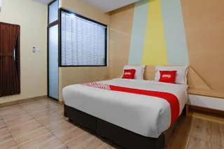 Медан: Capital O 3476 Millenium Inn