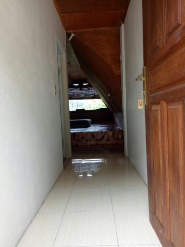 Озеро Тоба: Laster Jony's Guesthouse Samosir RedPartner