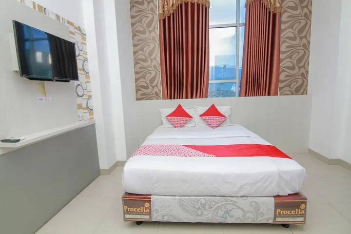 Палу: R Four Hotel by OYO Rooms
