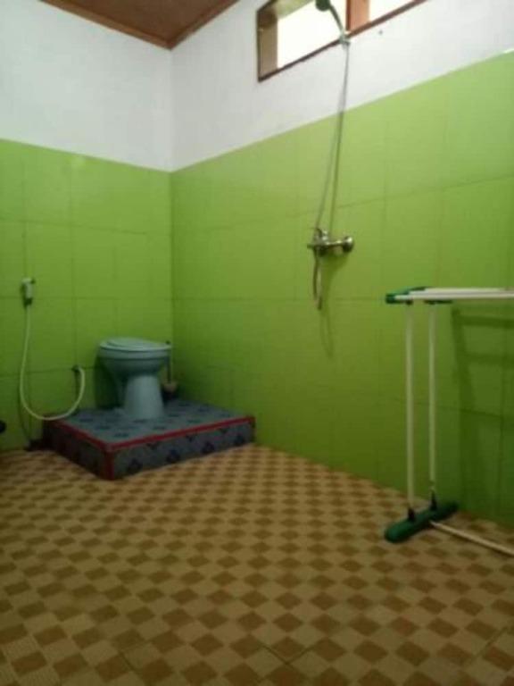 Озеро Тоба: Laster Jony's Guest House