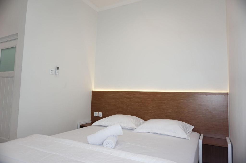 OYO 90023 Damar Kusumo Guest House — фото 4