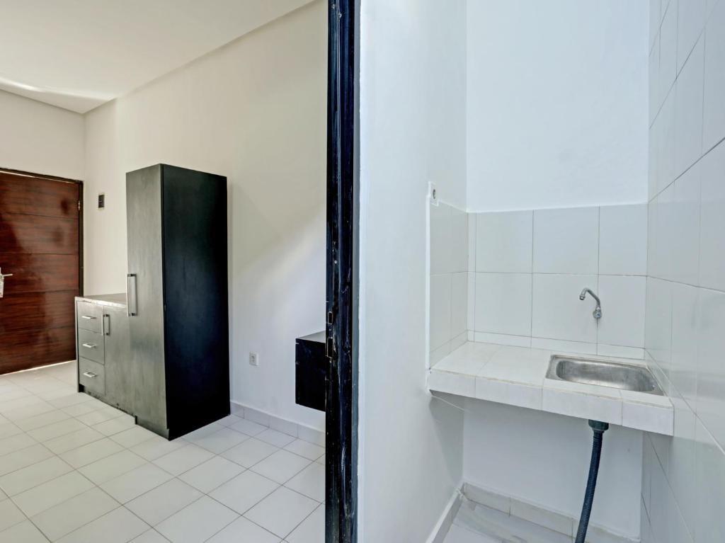 Денпасар: OYO 90456 Moh Yamin Residence