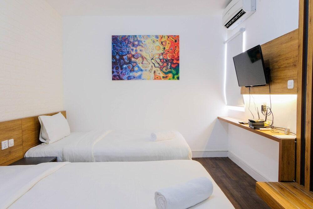 Studio Apartment with Twin Bed at Aeropolis Residence — фото 5