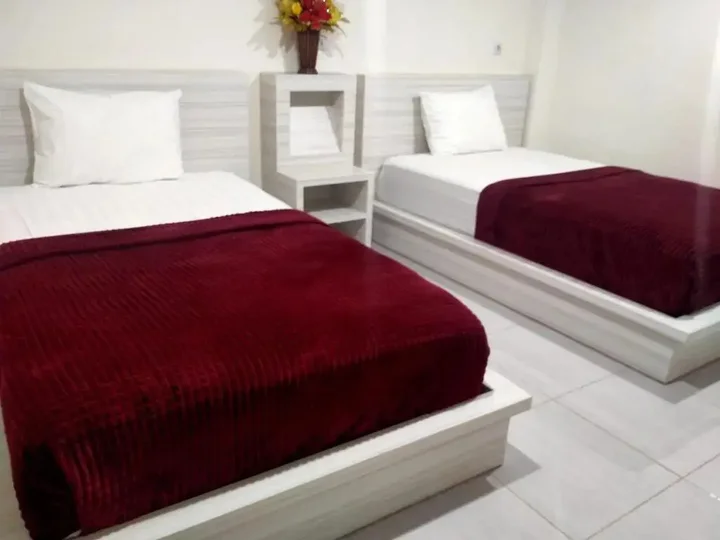 Палу: Granada Inn Palu