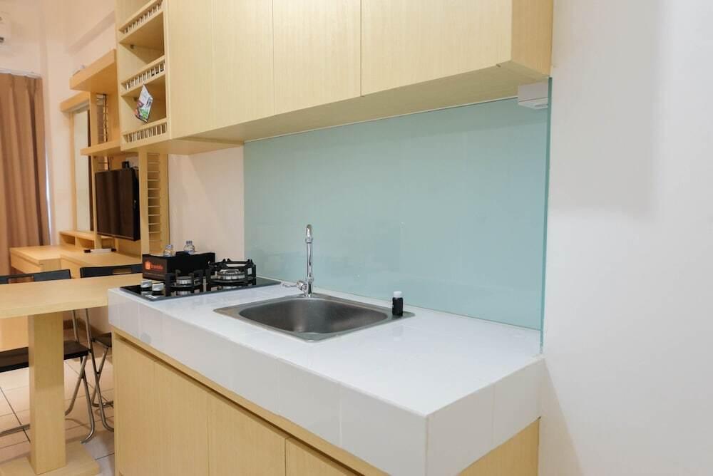 Legok: Comfy Studio Apartment at M-Town Residence near Summarecon Mall