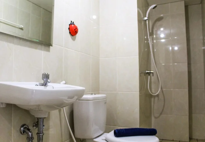 Legok: Relaxing 2BR Apartment at M-Town Residence By Travelio
