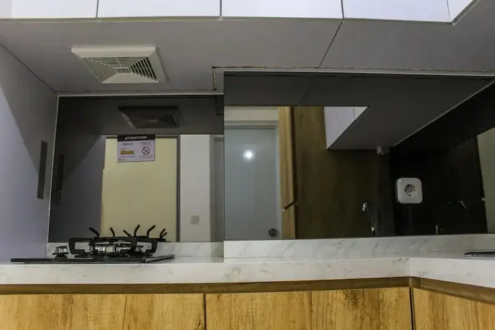 Legok: Relaxing 2BR Apartment at M-Town Residence By Travelio