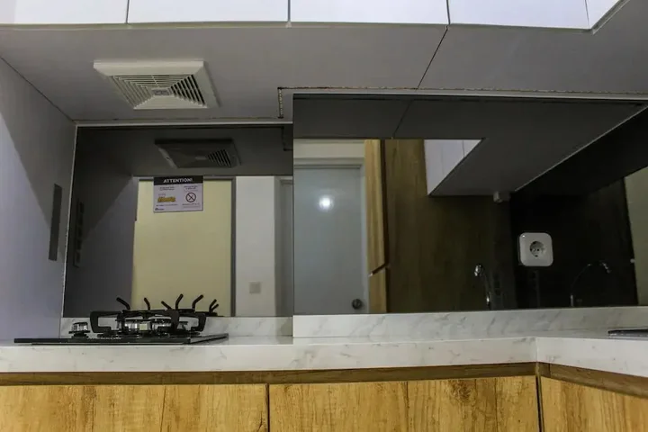 Legok: Relaxing 2BR Apartment at M-Town Residence By Travelio