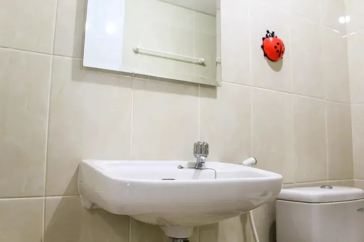 Legok: Relaxing 2BR Apartment at M-Town Residence By Travelio
