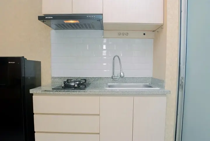 Джакарта: Minimalist 1BR with Pool View at Bassura City Apartment