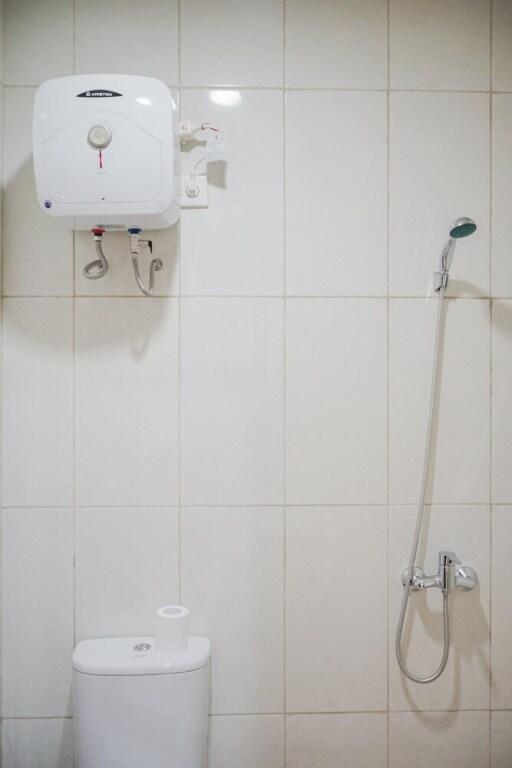 Legok: Warm and Simple 1BR at Asatti Apartment