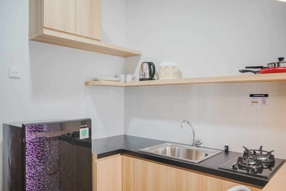 Legok: Warm and Simple 1BR at Asatti Apartment