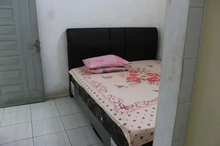 Петумбак: Penginapan Transit Tomato