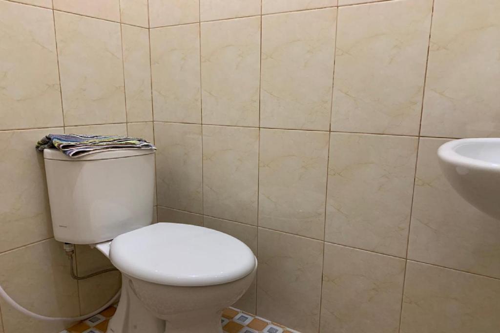 Пеканбару: OYO 3168 Utama Sari Homestay