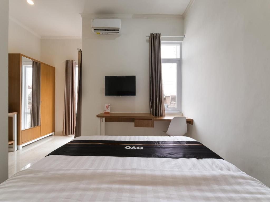 Super OYO Collection O 90023 Damar Kusumo Guest House — фото 3