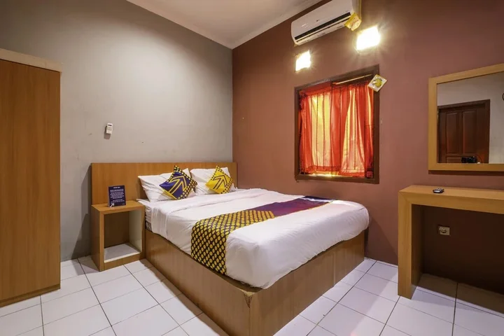 Караванг: Wisma Syariah
