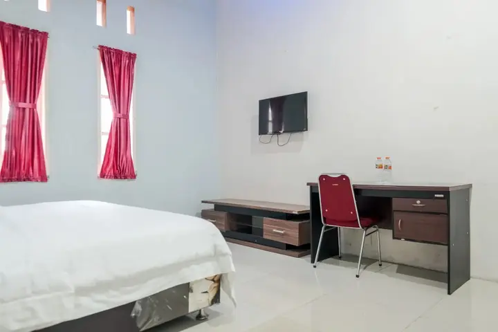Медан: Djaboerigin Mongonsidi Guest House RedPartner