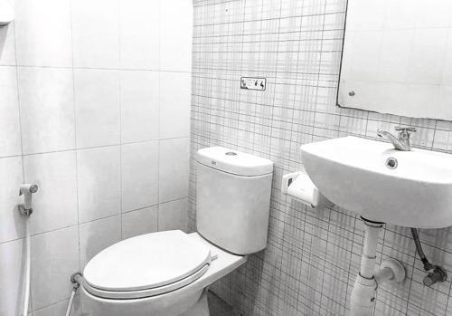 Сурабая: Audah Syariah Residence RedPartner
