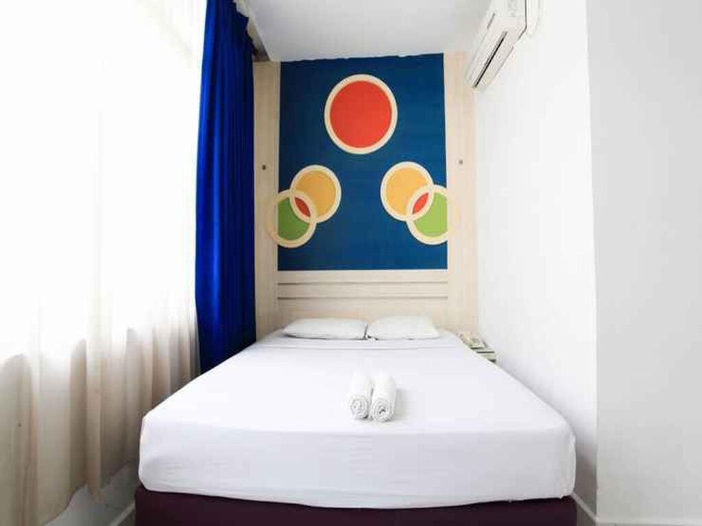 Пеканбару: Wisma Rainbow Pekanbaru