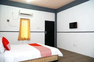 Баликпапан: Martha Guest House by OYO Rooms