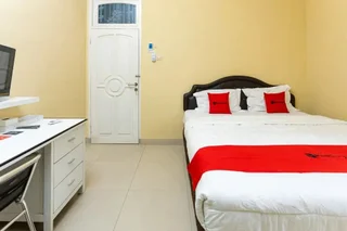 Маланг: Kost Omah Bratan by RedDoorz