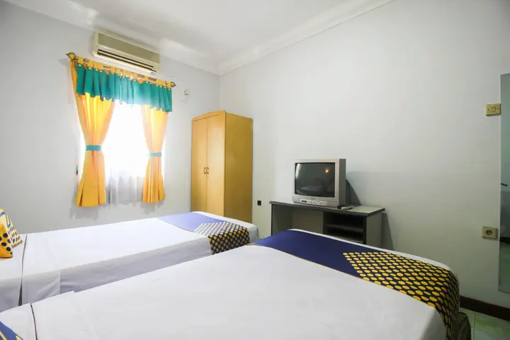 Пеканбару: Wisma Dahlia by OYO Rooms