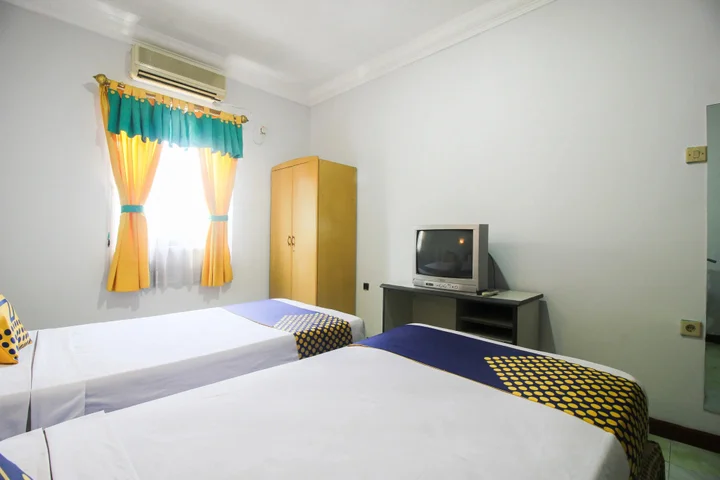 Пеканбару: Wisma Dahlia by OYO Rooms