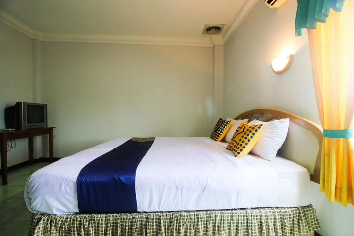 Пеканбару: Wisma Dahlia by OYO Rooms
