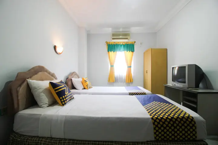 Пеканбару: Wisma Dahlia by OYO Rooms