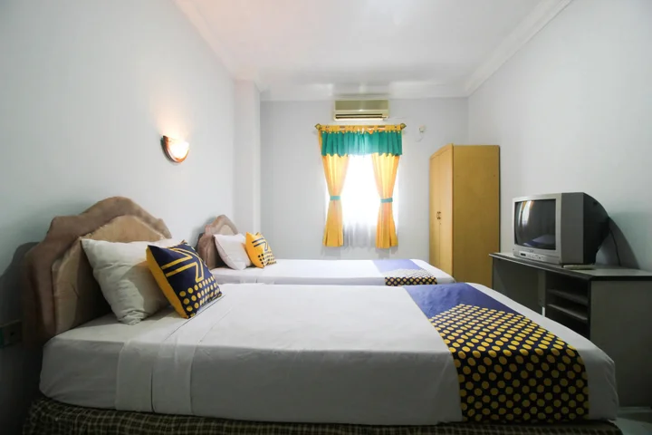 Пеканбару: Wisma Dahlia by OYO Rooms