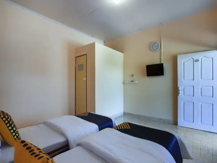 Паданг: Harland Guesthouse by OYO Rooms