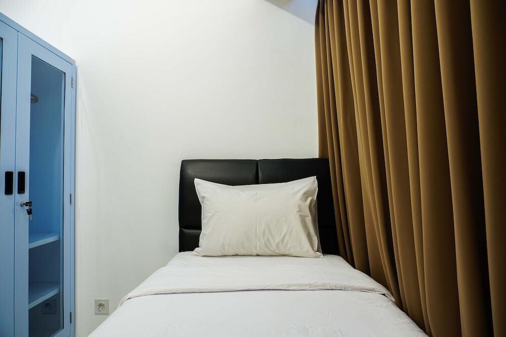 Legok: Minimalist and Warm 2BR M-Town Apartment