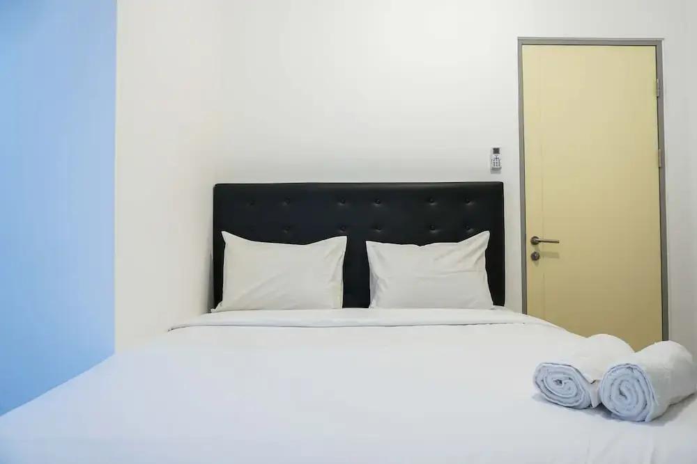 Legok: Minimalist and Warm 2BR M-Town Apartment
