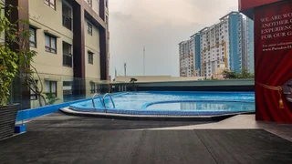 Legok: Comfy and Minimalist 1BR Apartment at Atria Residence