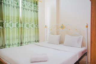 Тангеранг: Homey and Simple 2BR at The Medina Apartment