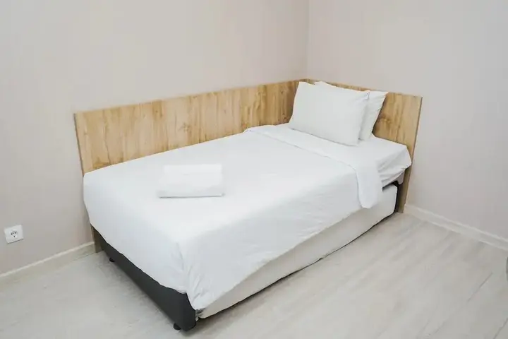 Legok: Cozy and New 2BR at Marigold Nava Park Apartment
