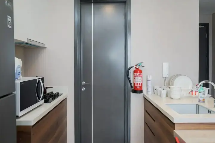 Legok: Cozy and New 2BR at Marigold Nava Park Apartment