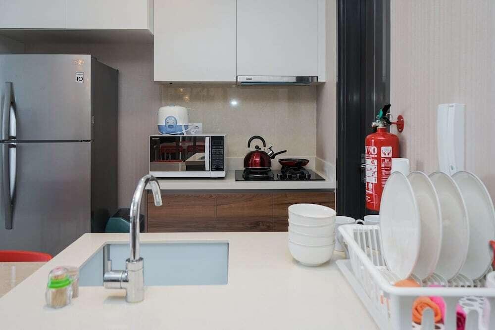 Legok: Cozy and New 2BR at Marigold Nava Park Apartment