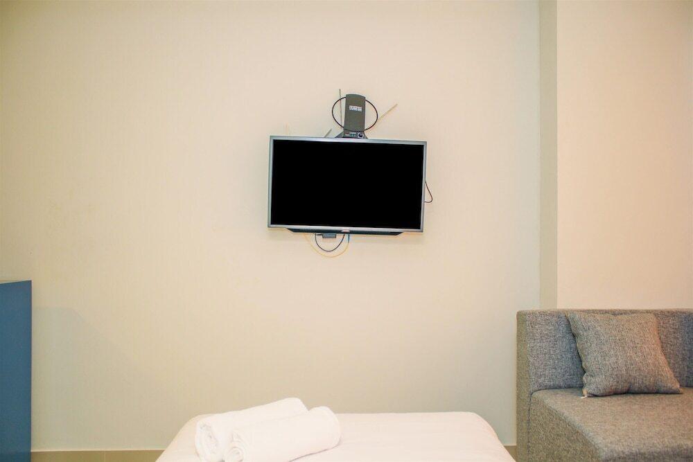 Brand New and Comfy Studio Modern Room at Evenciio Apartment — фото 5
