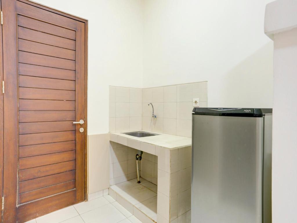 Падангсамбиан: OYO Flagship 90754 Alamanda Guesthouse